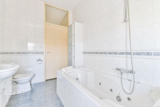 Modern bright cozy bathroom in elegant accom accommodation