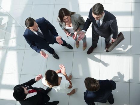 top view. employees discussing important issues. photo with text space