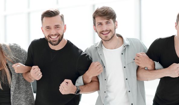 young human put their hands together. Teamwork concept.