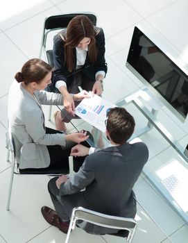 top view.business team at an informal meeting.Business planning