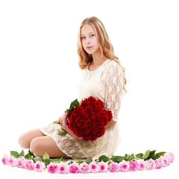 Beautiful young teen girl with a bouquet of flowers. The concept of style and fashion.Isolated on white background.