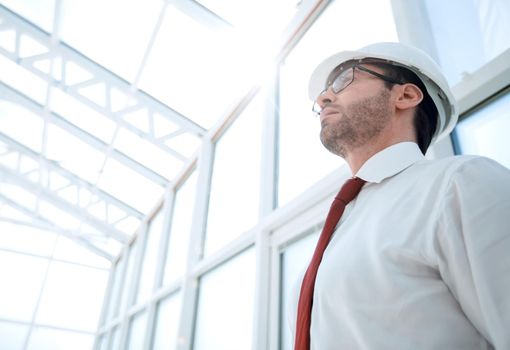 architect designer looking in an empty office.photo with copy space