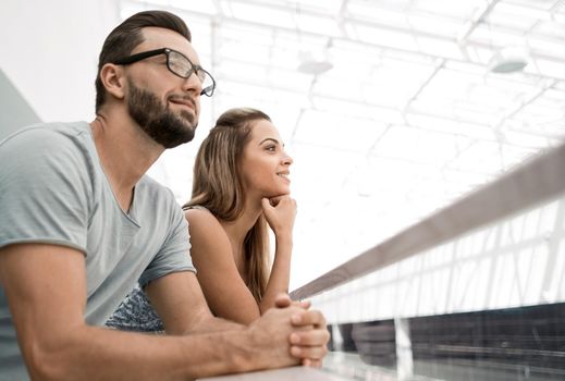 close up.young couple standing on the terrace of the hotel.photo with copy space