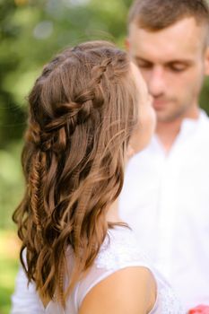 Happy groom with caucasian bride. Concept of married couple and love.