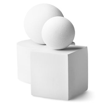 White cylinder, two balls and a square isolated on white background