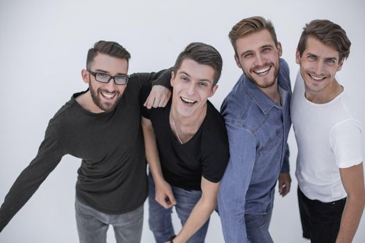 Close-up of people smiling together against white background