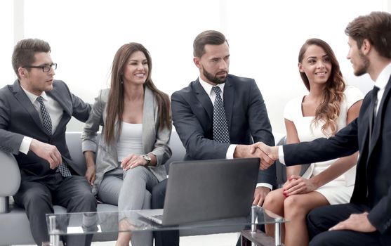 business partners shaking hands during negotiations. the concept of cooperation