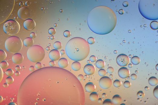 Oil drops in water. Abstract psychedelic pattern image multicolored. Abstract background with colorful gradient colors. Dof.