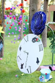 Clock as decoration on children playground in summer camp.