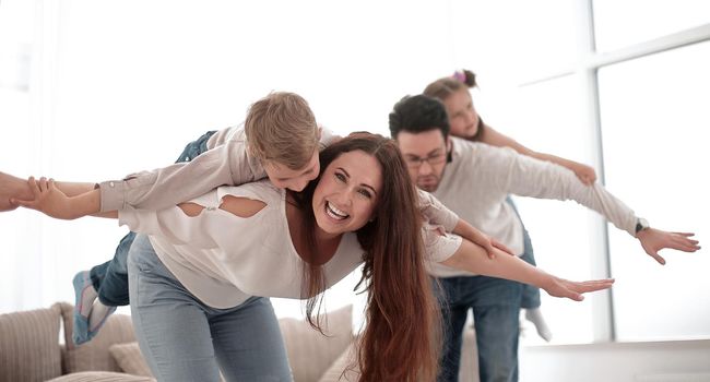 happy parents with their children have fun .photo with copy space