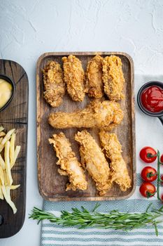 Korean barbeque fried chicken cuts on white background, flat lay.