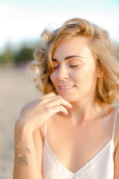 Close up portrait of young blonde pretty woman without makeup. Concept of natural beauty and feamale person.