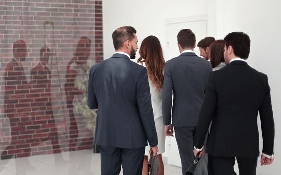 employees of the company are on the office hall. office weekdays
