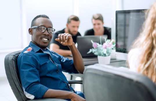 successful employee sitting at the Desk.business people