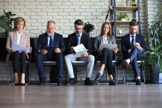 Modern business people waiting for job interview.