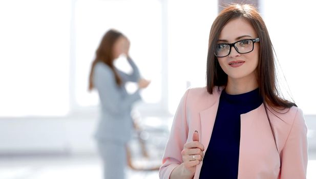 successful business woman shows a thumb up.photo with copy space