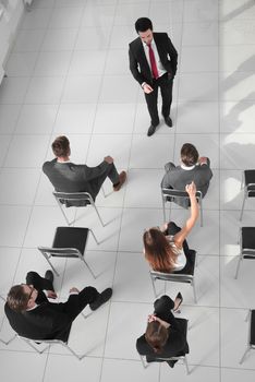 top view of the company's shareholders at a meeting