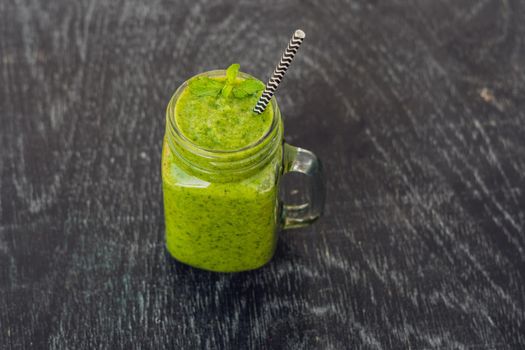 Green smoothies made of spinach. Healthy eating and sports concept.