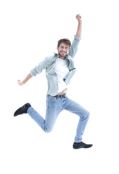 happiness, freedom, movement and people concept - smiling young man jumping in air