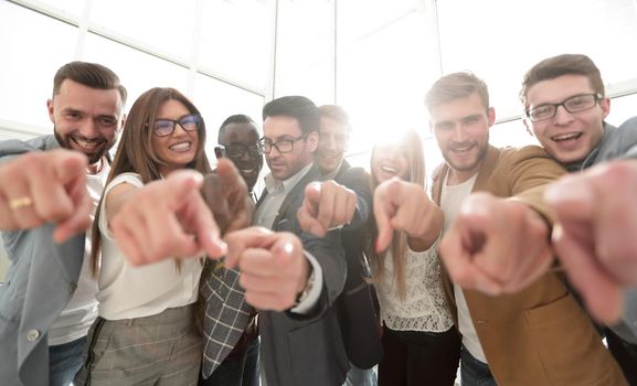 group of successful business people pointing at you.goal concept