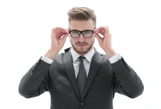 Portrait of handsome young businessman wearing glasses isolated on white background