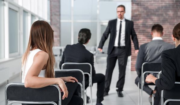 Businessman giving presentation to his Colleagues