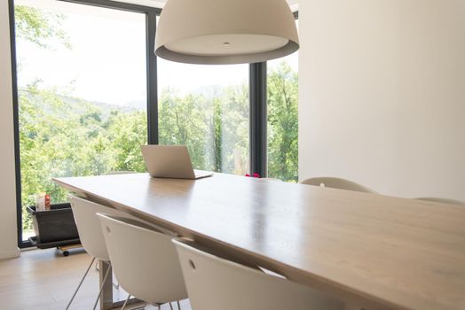 laptop on a kitchen table