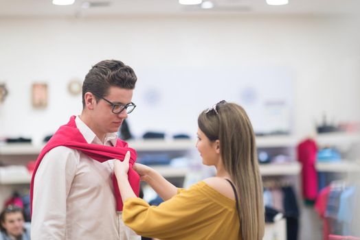 Attractive Couple Shopping In A Man's Clothing Store