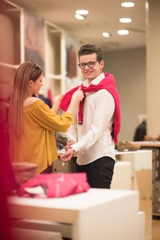 Attractive Couple Shopping In A Man's Clothing Store