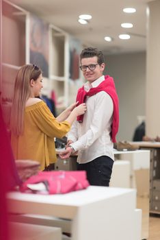 Attractive Couple Shopping In A Man's Clothing Store