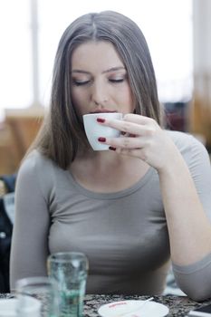 beautiful young woman student portrait while relax on coffee break