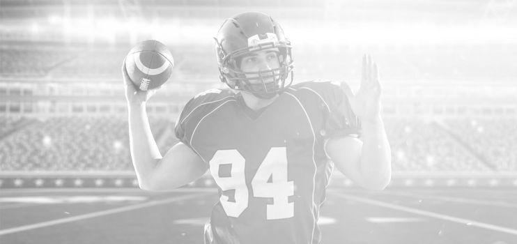 one quarterback american football player throwing ball on big modern stadium with lights and flares