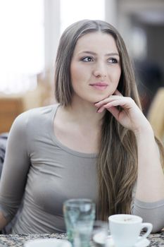 beautiful young woman student portrait while relax on coffee break