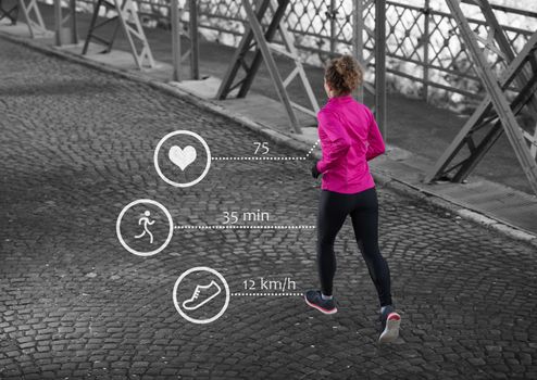 Woman running across the bridge with statistics in background