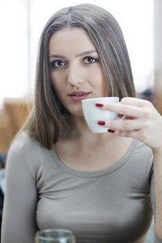 beautiful young woman student portrait while relax on coffee break