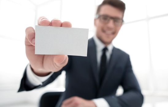 businessman showing blank business card .business concept