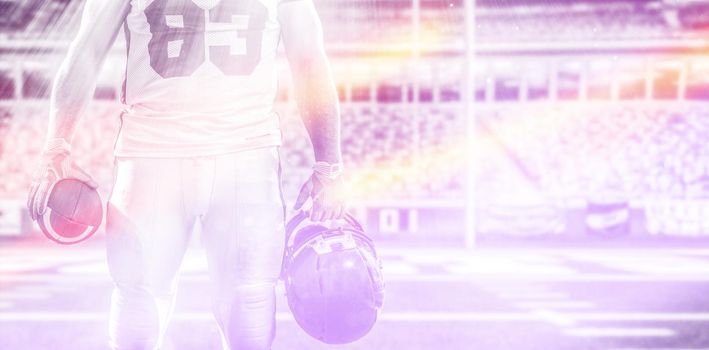 Closeup Portrait of a strong muscular American Football Player on big modern stadium field with lights and flares