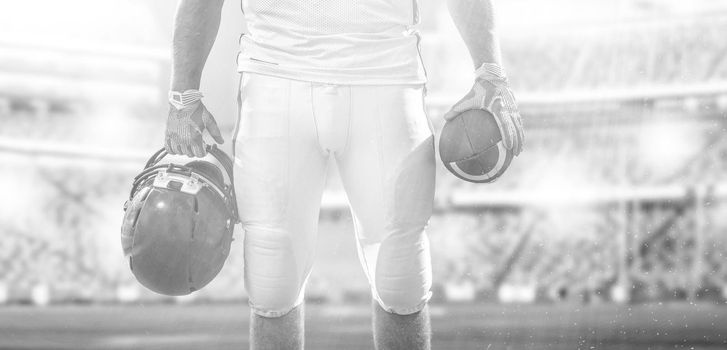 Closeup Portrait of a strong muscular American Football Player on big modern stadium field with lights and flares