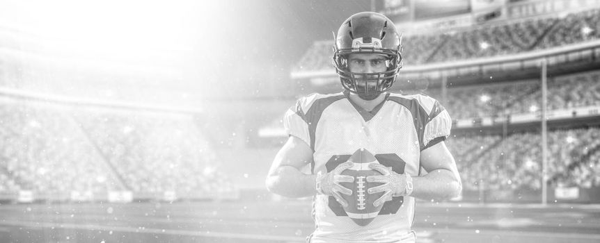 American Football Player isolated on big modern stadium field with lights and flares