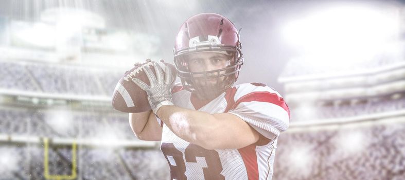 one quarterback american football player throwing ball on big modern stadium field with lights and flares