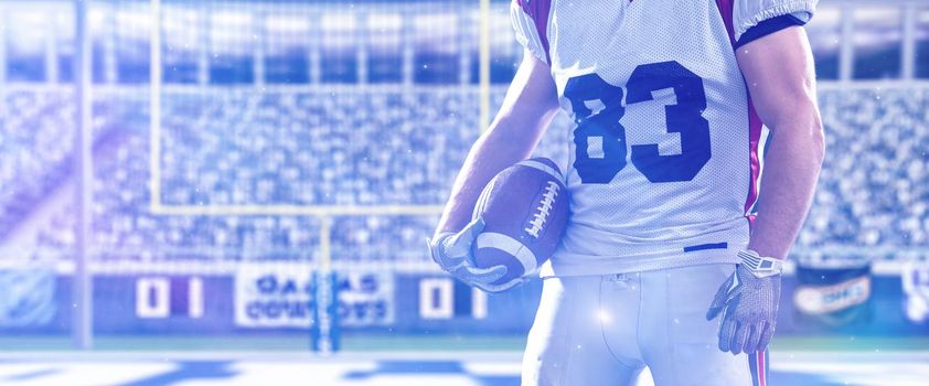 Closeup Portrait of a strong muscular American Football Player on big modern stadium field with lights and flares