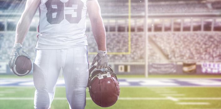 Closeup Portrait of a strong muscular American Football Player on big modern stadium field with lights and flares