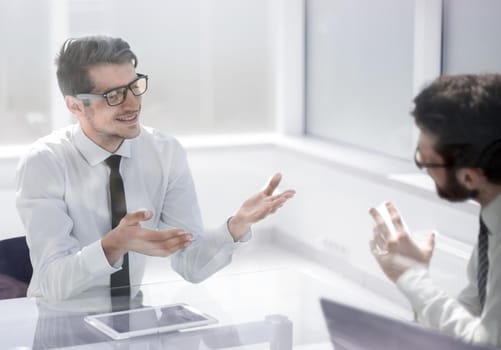 employees discuss ideas for a new business project.photo with copy space