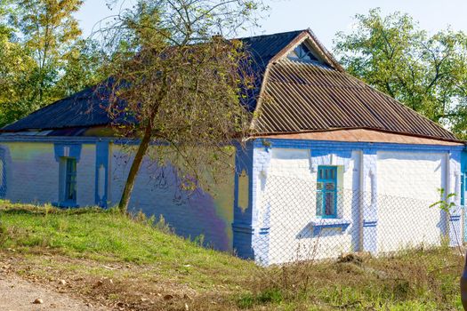 Old village house in the village of Olshana in Ukraine. House of my childhood. Nostalgia concept, rural life.