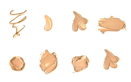 Beige beauty cosmetic texture isolated on white background, smudged makeup emulsion cream smear or foundation smudge, crushed cosmetics product and paint strokes.