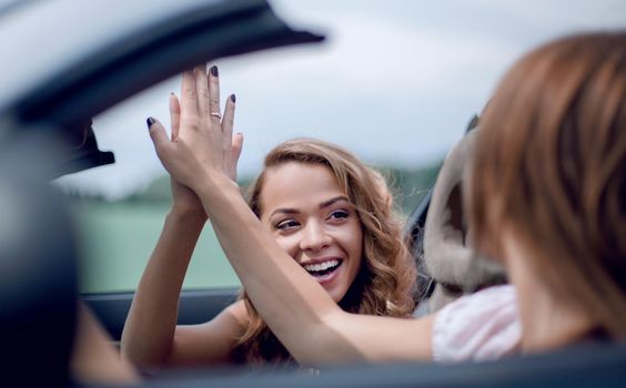 close up.good friends giving each other high five.the freedom of the open road