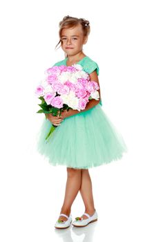 Little girl with a beautiful bouquet of flowers. The concept of holidays, family and children. Isolated on white background.