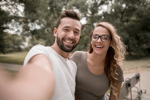 close up.portrait of a happy couple on a Park background