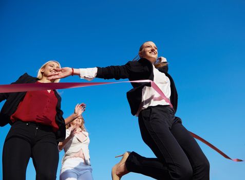 business people running together on  athletics racing track