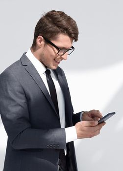 close up.smiling businessman talking on mobile phone.photo with copy space